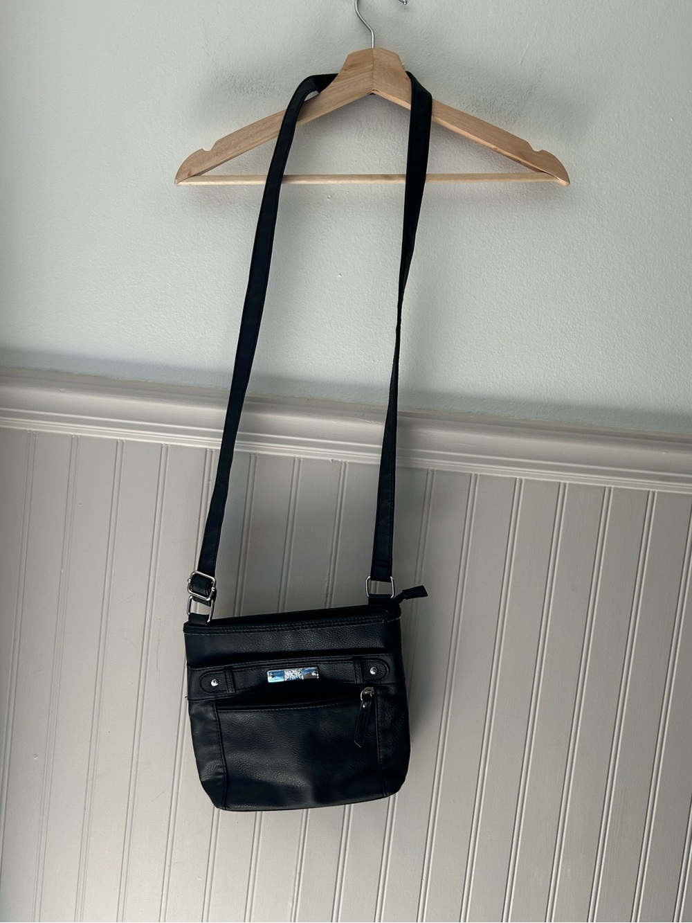 black faux-leather crossbody bag